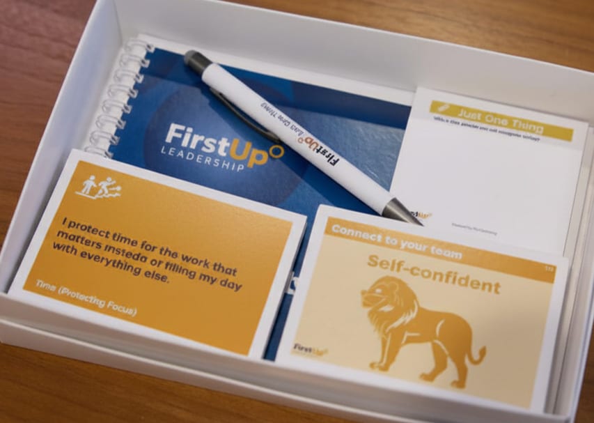 The FirstUp Essentials toolkit: booklet, coaching cards and pen
