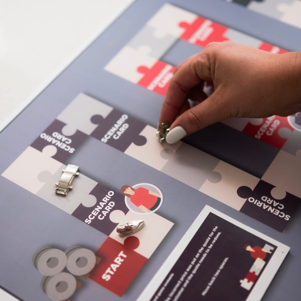 Participant working with an interactive scenario-card learning activity
